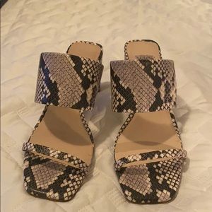 Heeled mules snakeskin